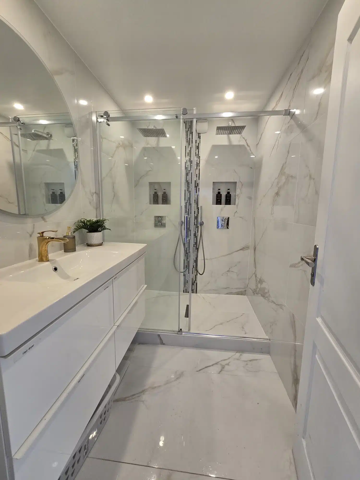 Salle de bain rénovée par Azurix à Paris 13